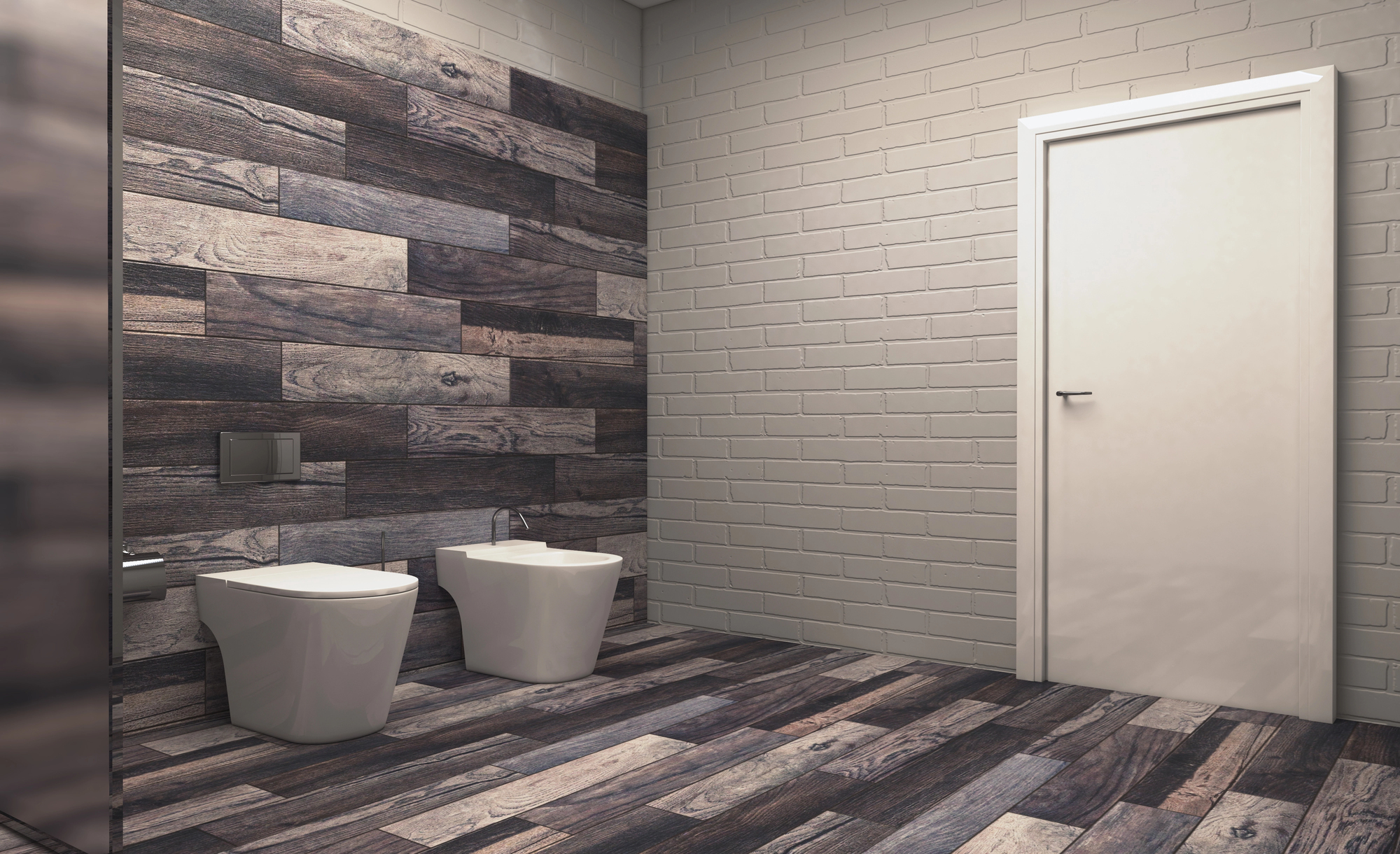A modern bathroom with a toilet and bidet, wood-patterned floor and wall tiles, light gray brick walls, and a closed white door.